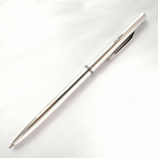 The William Manton Sterling Silver twist action biro, plain or engine turned finish.